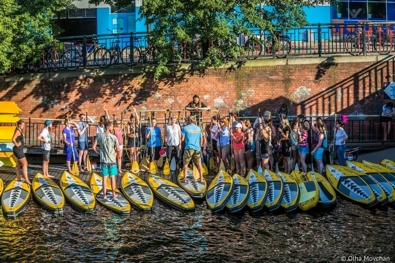 SUP stand-up paddleboarding on the Amstel — corporate outing Amsterdam