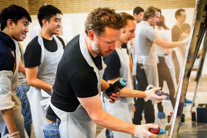 Graffiti workshop Amsterdam — team creates a collective mural