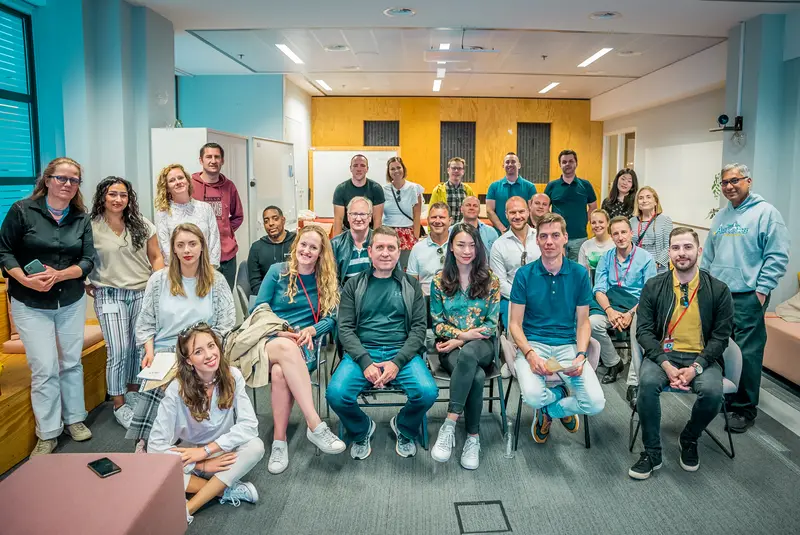 Booking.com team members navigating Amsterdam's canal district during their Treasure Hunt event