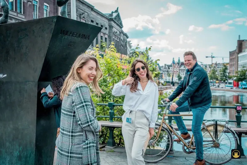 Participants exploring Amsterdam canals during a team building Treasure Hunt
