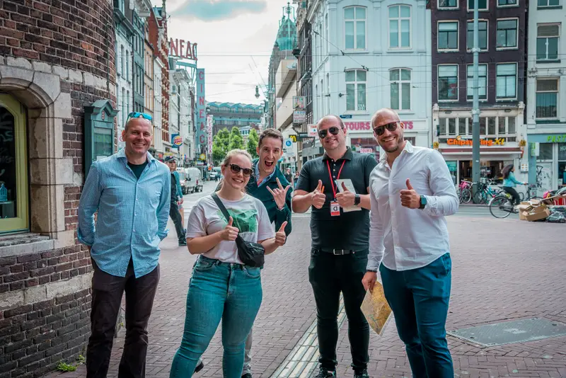 Group celebrating in Amsterdam city centre during the Treasure Hunt